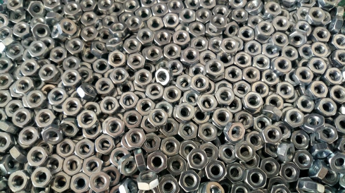 Clean dry steel nuts after industrial degreasing and drying service in Nashik